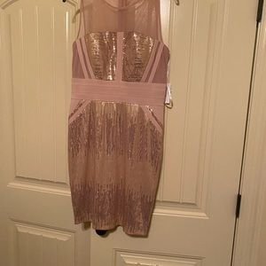 Knit and sequin Calvin Klein dress. Dress is actually a blush/peachy color.